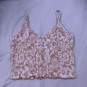 Selling an American Eagle floral yellow & white tank top with adjustable straps
